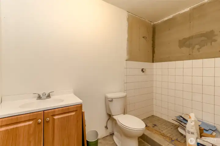 Roughed in Bathroom in large shop