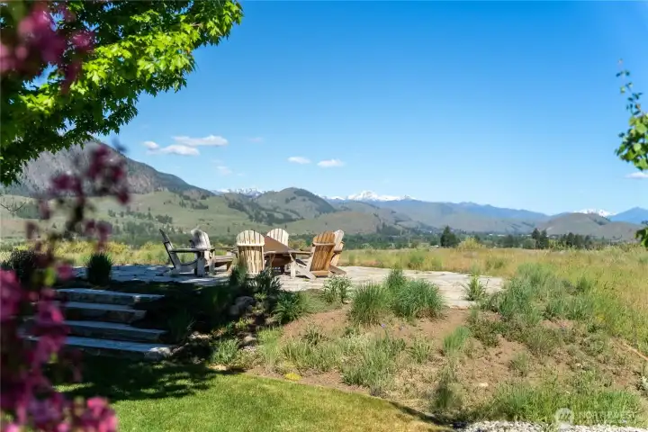 An elevated fire pit is perfectly situated for nighttime star gazing.
