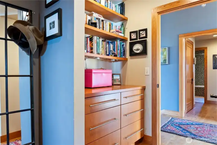 The bedroom suites are located on either side of the entry hall.