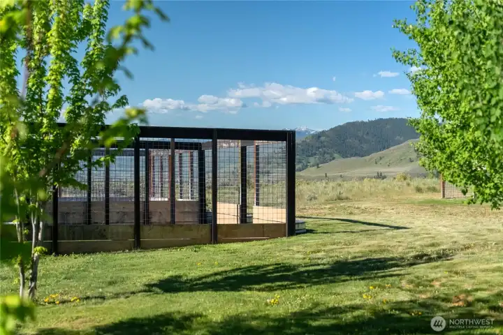 A fenced garden and dog runs are located nearby. Even the four-legged friends get to enjoy the view!