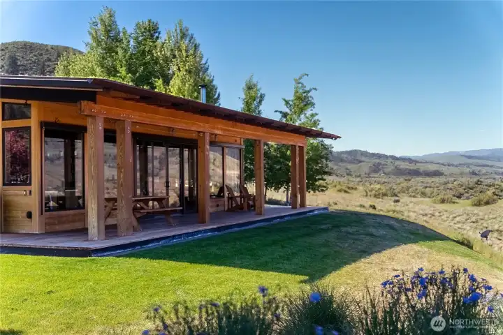 The robust columned porches are a key feature of the home.