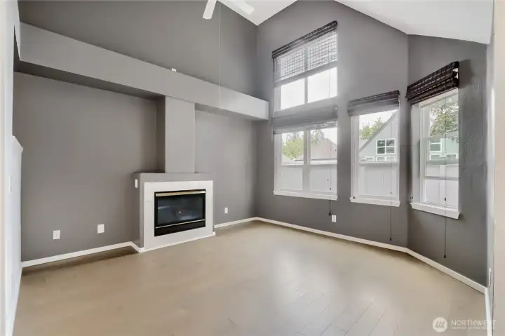 Soaring ceilings in the living room create an open, airy feel.