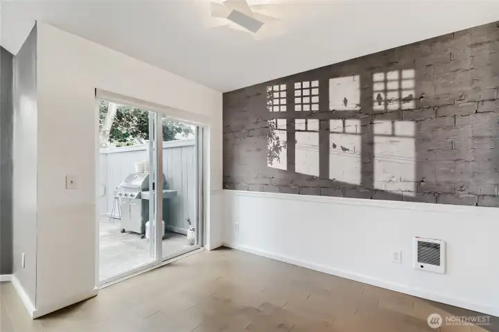 A slider off the dining area opens to the patio.