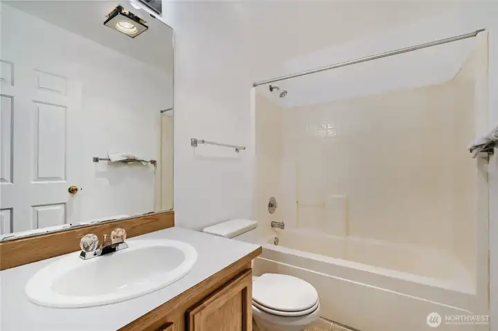 Full bath off the loft on the upper level.