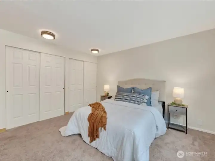 The primary bedroom is very spacious and can accommodate a king size bed and nightstands, easily. The primary bedroom is very spacious and can accommodate a king size bed and nightstands, easily.