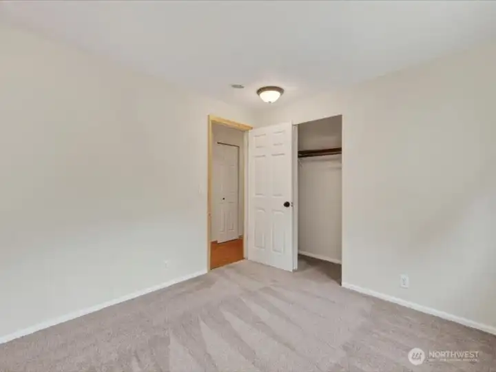 Looking toward the closet of the 3rd bedroom with the hallway beyond. Looking toward the closet of the 3rd bedroom with the hallway beyond.