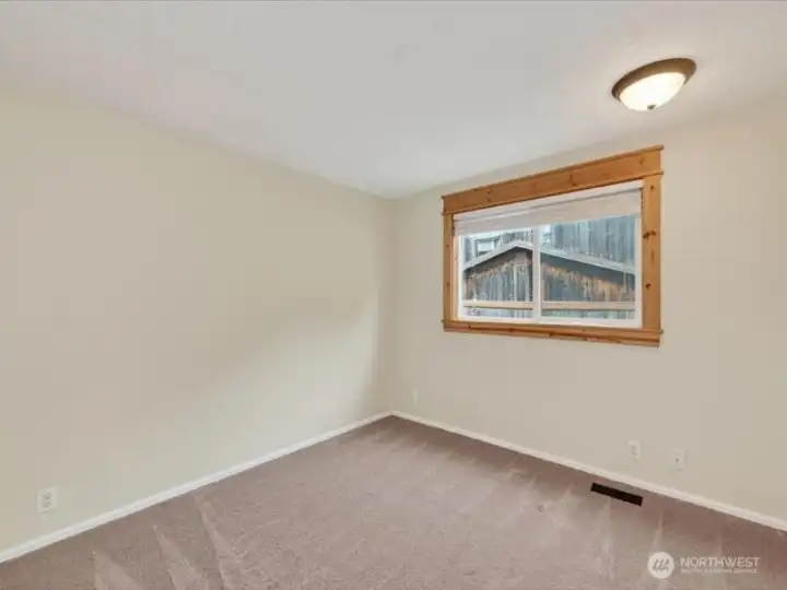 The 4th bedroom also looks to the side yard and is quite large. The 4th bedroom also looks to the side yard and is quite large.