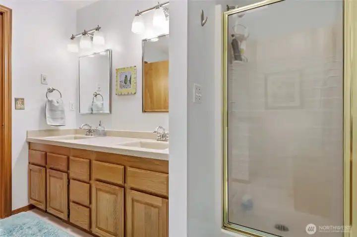 Separate shower in primary bathroom.
