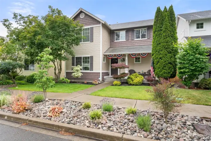 Meticulously maintained inside and out. Street border professionally landscaped with irrigation.