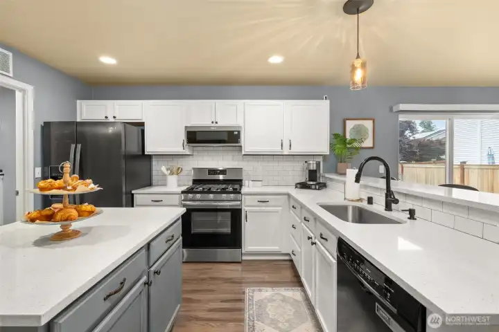 Kitchen refresh in 2019; quartz counters, tile backsplash, new sink/faucet and garbage disposal. New refrigerator and range in 2020.