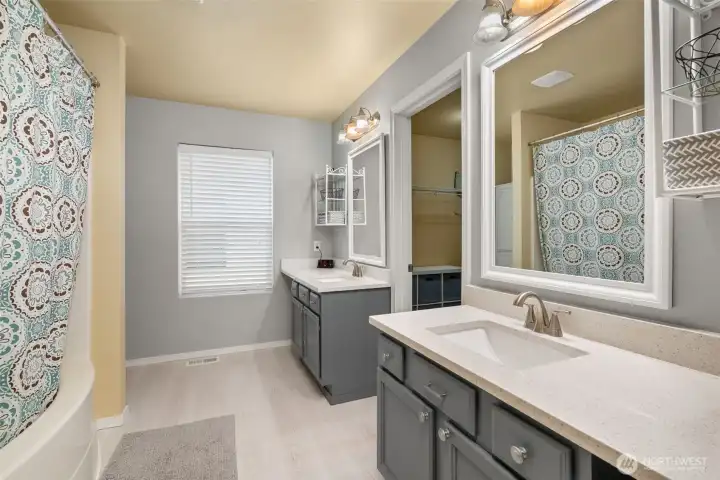 Split sink and counters in primary bathroom.