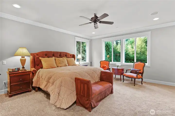 Primary Suite overlooking the private Lush back yard.