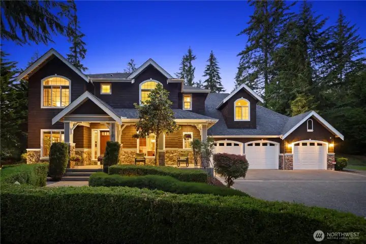 Professionally installed landscaping, 13 zone irrigation, and landscape lighting.