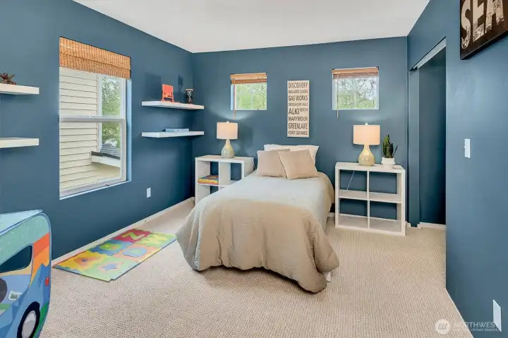 Light and bright guest bedroom with new carpet. Light and bright guest bedroom with new carpet.