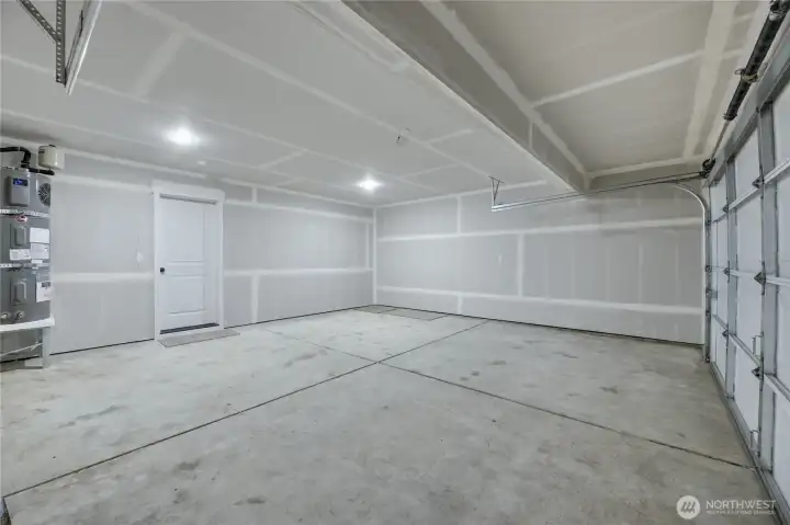 Fully finished garage pre-wired for garage door opener.