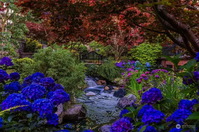 Lush grounds are meticulously maintained by the community gardeners