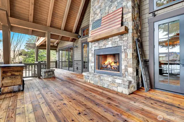 Enjoy the stone fireplace while barbecueing.