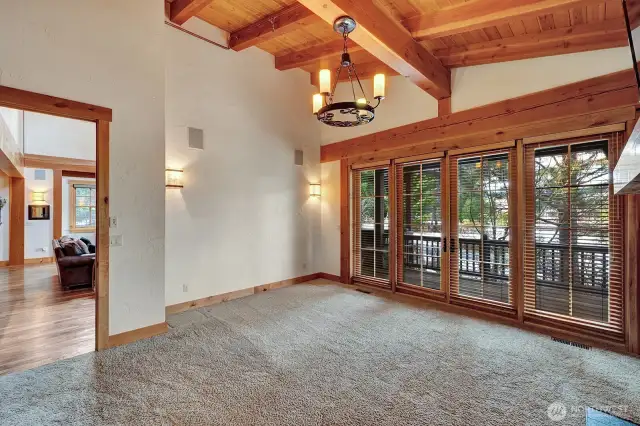 Doors exiting to deck from primary bedroom.