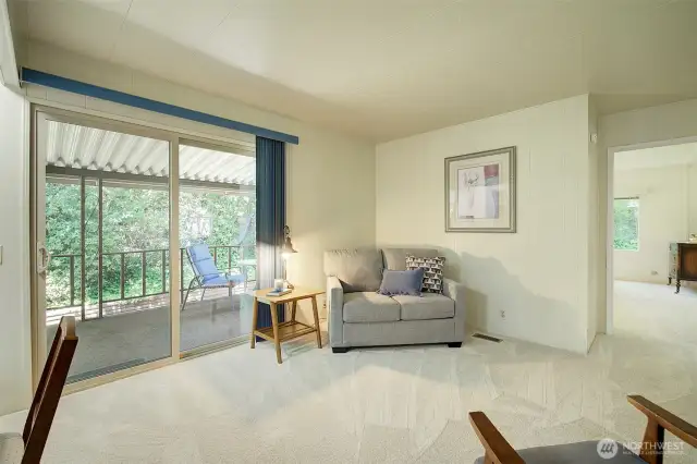 Large family room with access to back deck