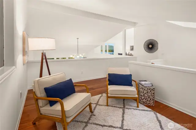 Upstairs space works as second family room or TV room.