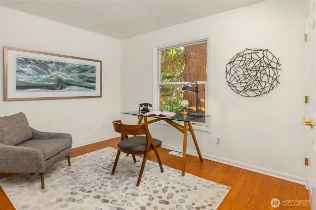 While currently set as an office, this is a main floor bedroom with closet off the entry.