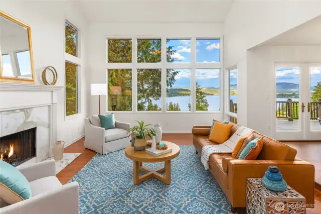 Vaulted ceilings and walls of windows showcase the stunning views.