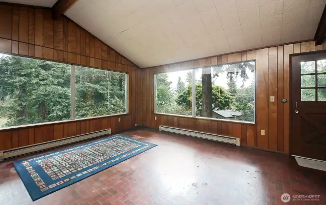 Living room with door to the deck on the right.