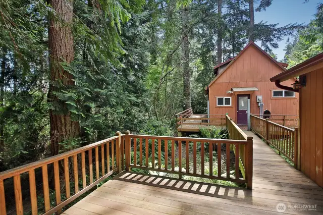 Deck leads to guest house.