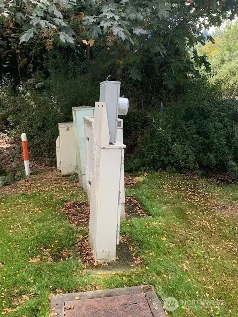 Lot B's property line is within a few feet to the south of this electrical post. This is the electrical for the neighboring property to the N, Brookshire Greenbelt.