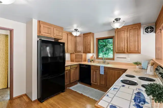 Kitchen with doorway to laundry/mud room