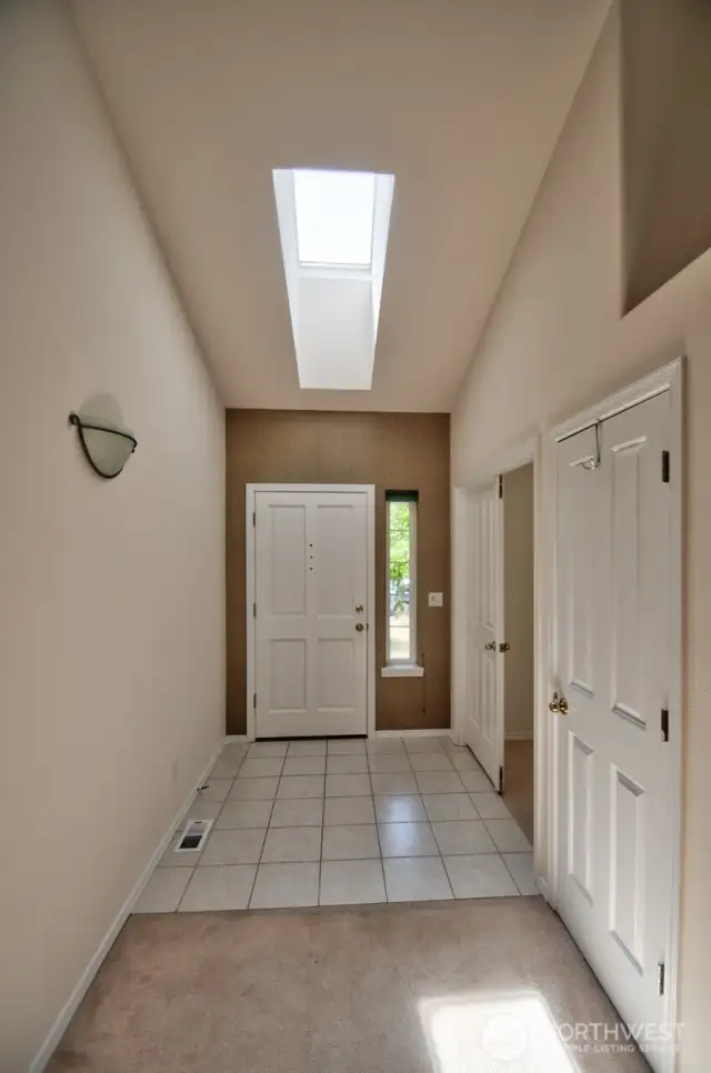 Entry with vaulted ceiling.