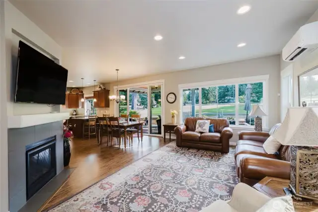 Great room with view of dining area and sliders to outside