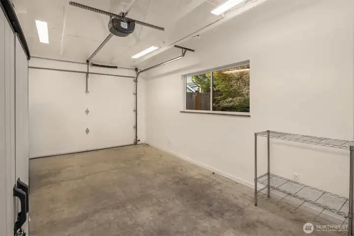 The owners turned the garage into a heated office space, added a window, and it really is a fantastic extra space. Fully painted, fresh paint, and more.
