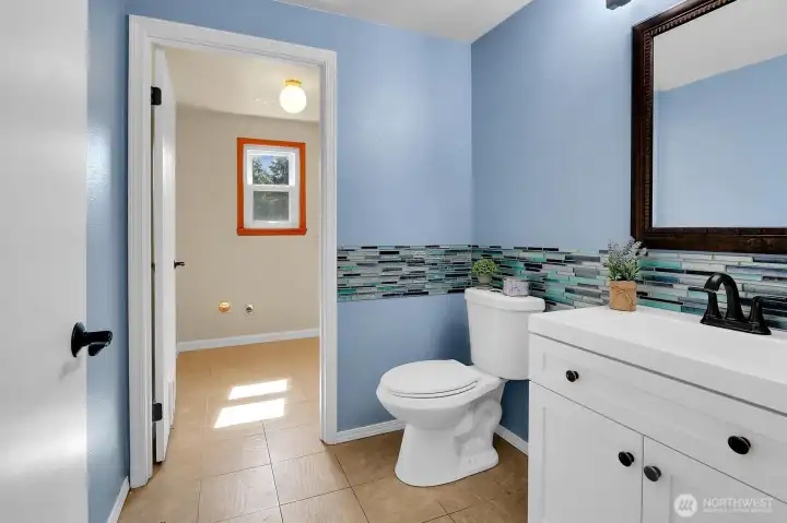 Powder Room & Laundry Room with a Utility Sink