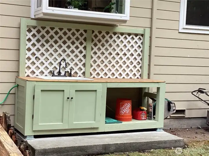 Gardening station with outdoor sink.