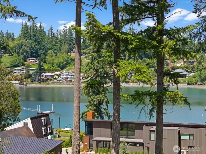 Take in sweeping views of Raft Island and the sparkling waters of Wollochet Bay – the perfect setting to build your dream home.