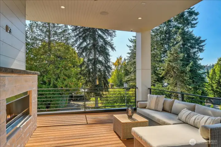 One of the two covered decks that are accessed from the living room