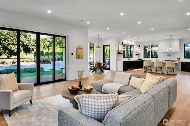 Family room opens to covered deck and beautifully landscaped back yard