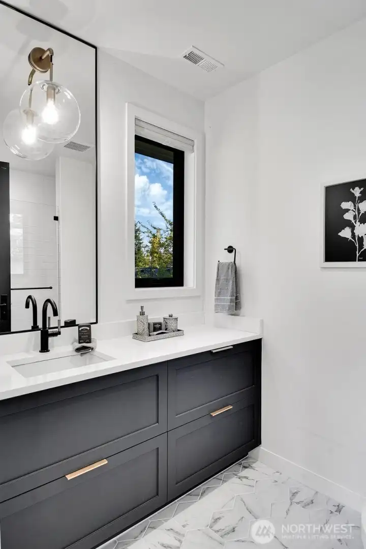 3/4 bathroom of upper level ensuite bedroom