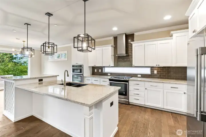 Double ovens, built-in microwave, wine storage, soft close drawers and cupboards