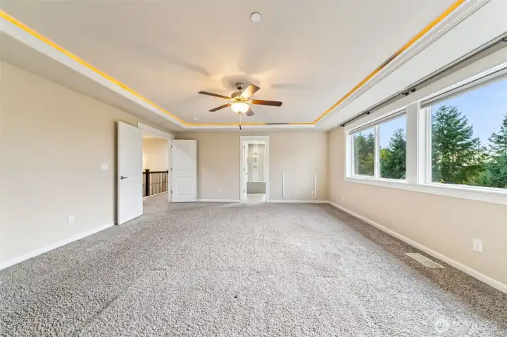 Primary bedroom with double doors
