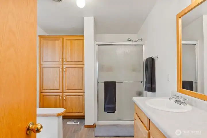 Primay suite bath complete with soaking tub.