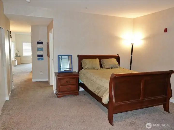 Entry and Open Bedroom....leading into the Kitchen and Living Room.