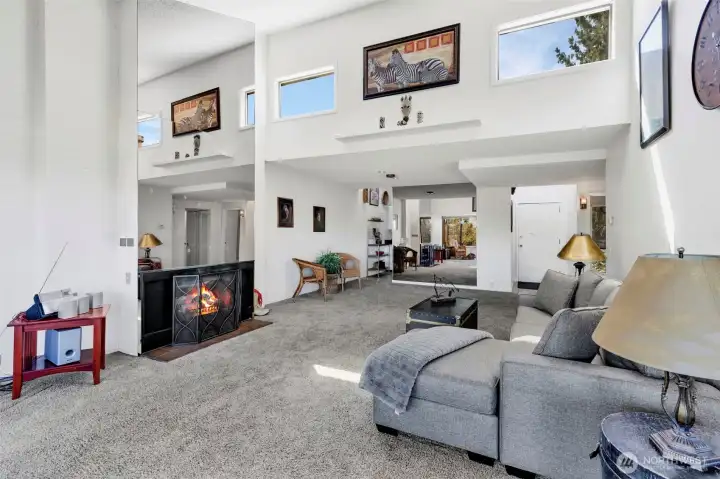 Looking back into the living room from the NE corner.  Note vaulted ceiling and clearstory windows above.
