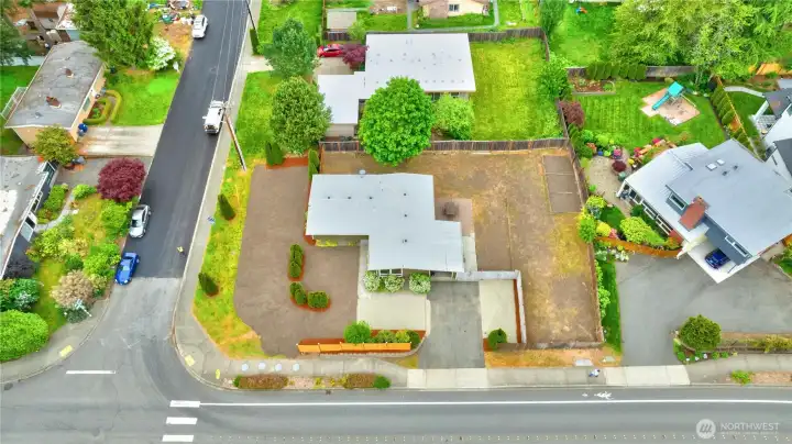 It is a spacious, flat corner lot with great usable land.