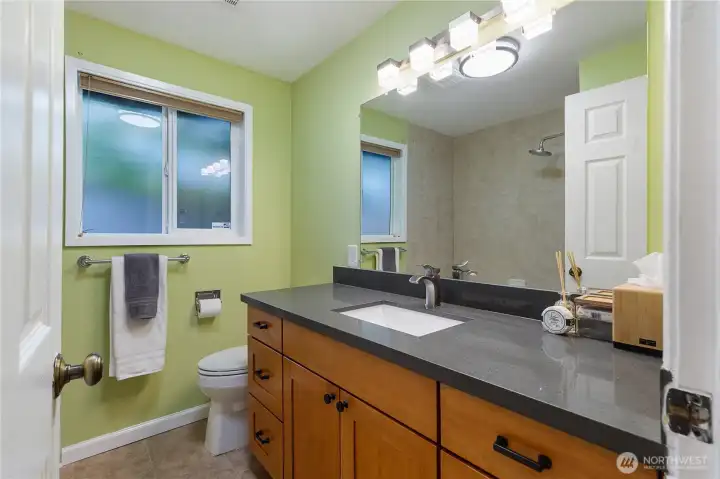 A full bathroom with a bathtub.