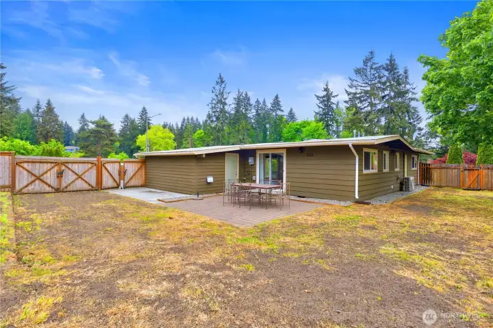 A spacious balcony directly off the kitchen, with RV parking conveniently located beside it.
