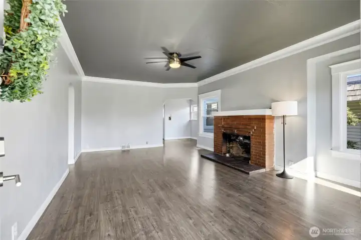 Adorned with classic time period details like gorgeous millwork, crown molding, high ceilings, arched doorways, and hidden original oak floors! Adorned with classic time period details like gorgeous millwork, crown molding, high ceilings, arched doorways, and hidden original oak floors!
