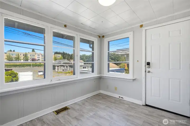 Enclosed sunroom off back entrance for ideal flex space (home office, craft room, gym,?). Enclosed sunroom off back entrance for ideal flex space (home office, craft room, gym,?).
