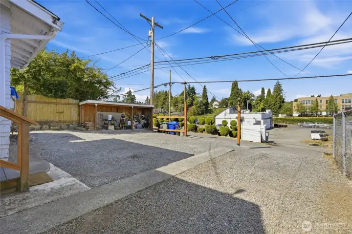 Detached garage in front and plenty of private driveway parking off back alley. Detached garage in front and plenty of private driveway parking off back alley.